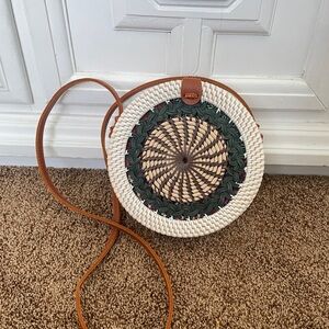 Round Woven Crossbody Bag with Green Accent